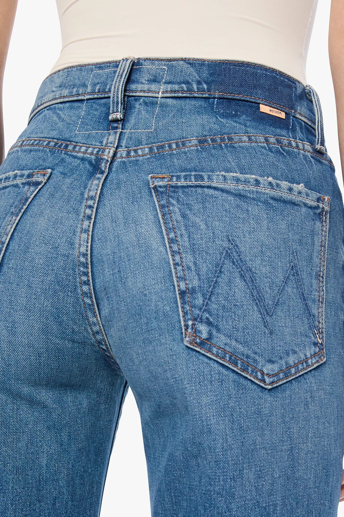 The Tomcat Roller Sneak Jeans Mother